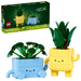 Plantas LEGO Botanicals Plantas Felices con drácena y pilea en macetas amarilla y azul con caritas sonrientes