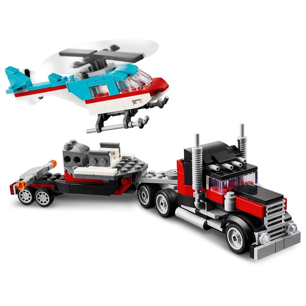 Camión Plataforma con Helicóptero