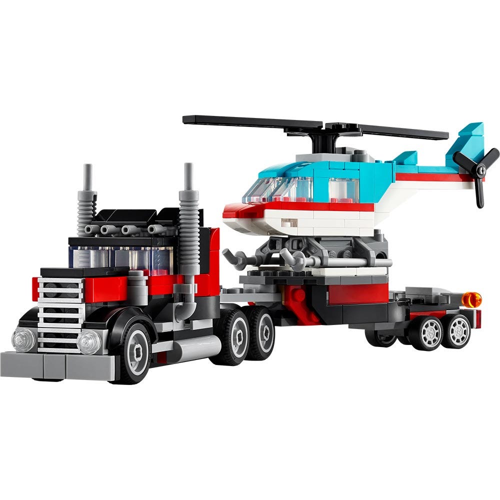 Camión Plataforma con Helicóptero