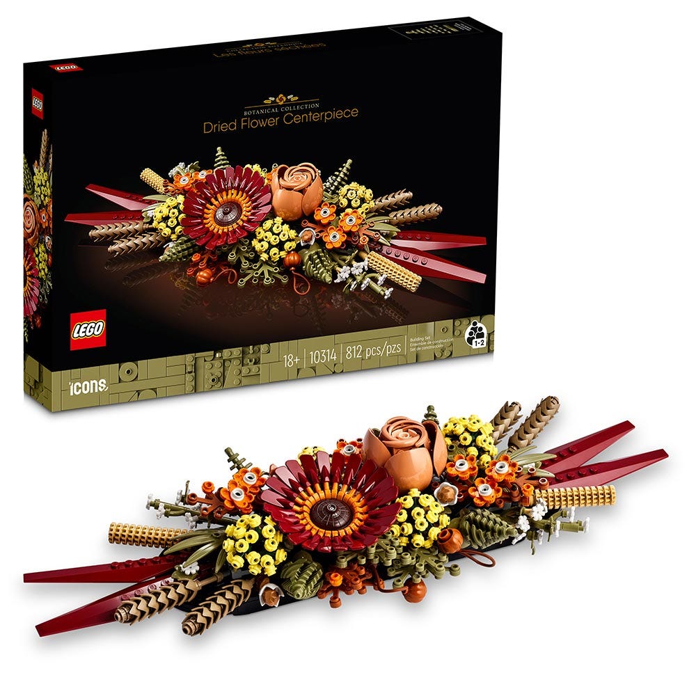Crea un centro de flores secas inspirado en el otoño con gerberas y rosas vibrantes. Diseñado para adultos, este set se puede construir en compañía, colgar en la pared o usar como centro de mesa. Un proyecto creativo y relajante que aporta color y elegancia sin mantenimiento.